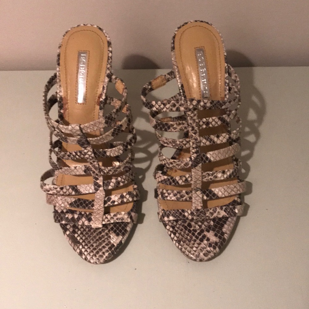BCBG caged snakeskin heels